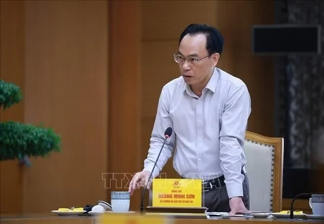 Bộ trưởng Bộ Giáo dục và Đào tạo Hoàng Minh Sơn báo cáo tình hình cung ứng sách giáo khoa cho năm học 2026 - 2027 và rà soát chương trình, sách giáo khoa giáo dục phổ thông. Ảnh: Dương Giang/TTXVN