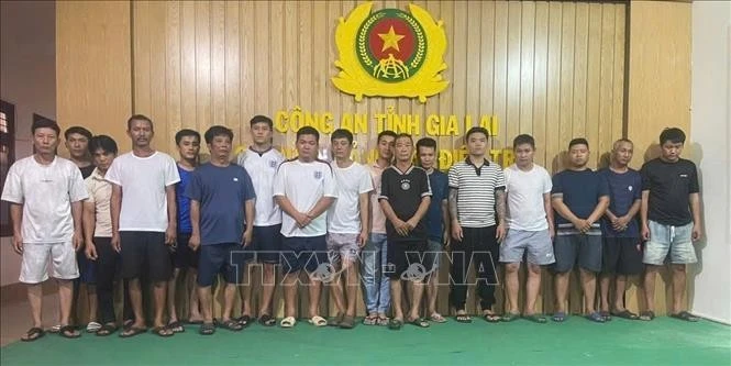 Các đối tượng tại Cơ quan Công an. Ảnh: TTXVN phát