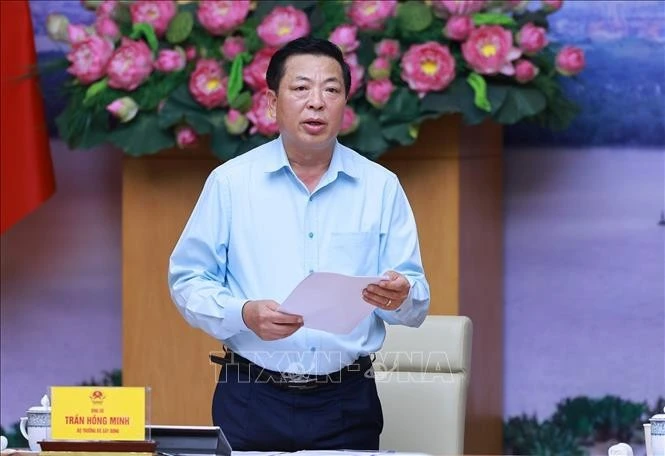Bộ trưởng Bộ Xây dựng Trần Hồng Minh báo cáo tiến độ thực hiện các dự án trọng điểm ngành giao thông vận tải.