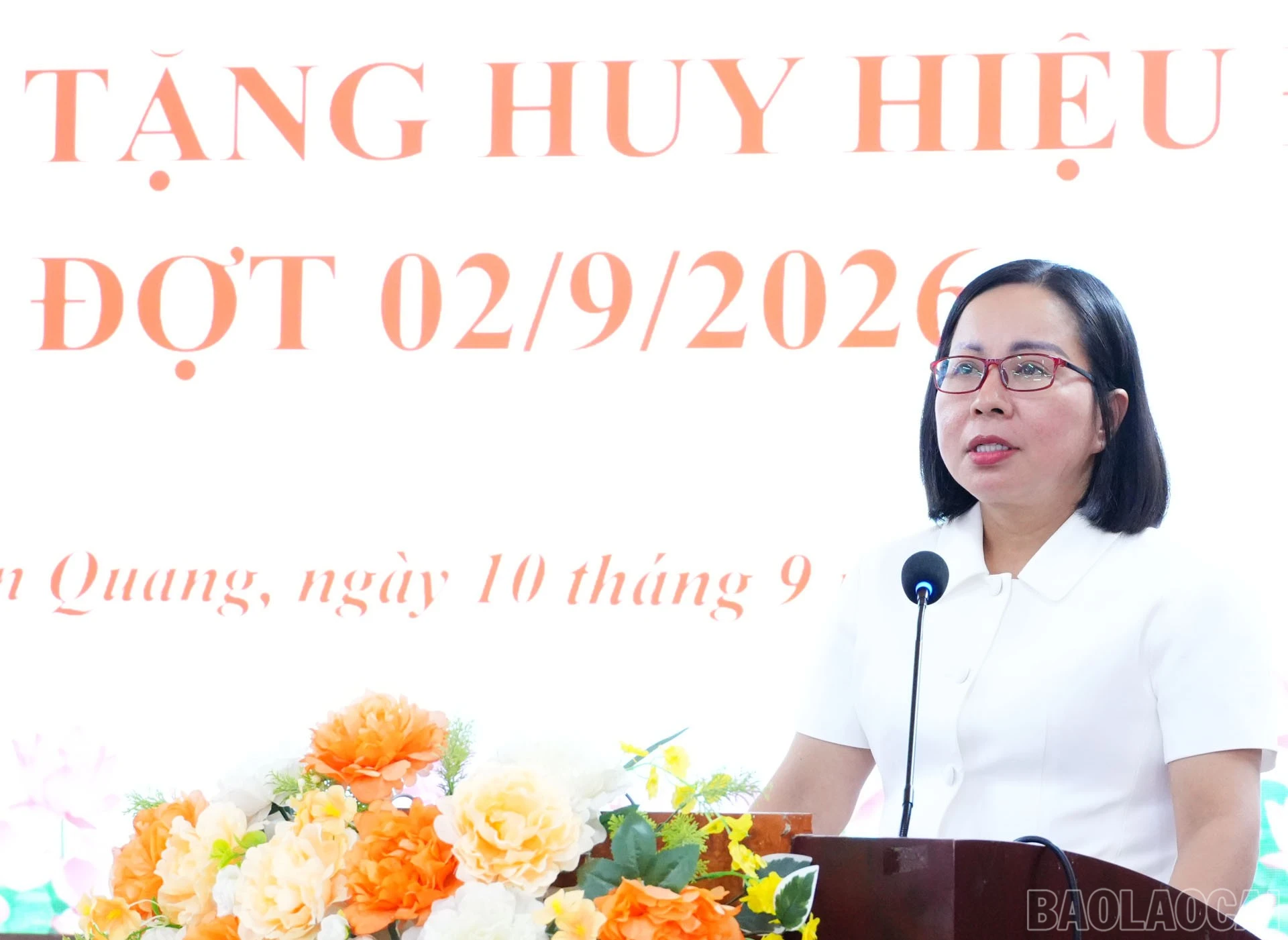 Đồng chí Lý Thị Vinh - Ủy viên Ban Thường vụ Tỉnh ủy, Bí thư Đảng ủy, Chủ tịch HĐND xã Bảo Thắng phát biểu tại buổi lễ.