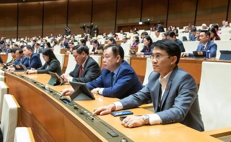 Đại biểu Quốc hội ấn nút biểu quyết tại Kỳ họp bất thường lần thứ 9.