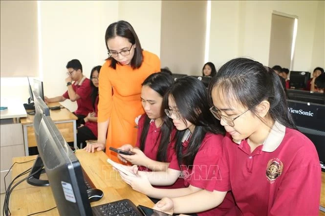 Thông tư mới áp dụng quy trình kiểm định với chương trình đào tạo các trình độ của giáo dục đại học và các chương trình đào tạo trình độ cao đẳng sư phạm. Ảnh minh họa: Bích Huệ/TTXVN