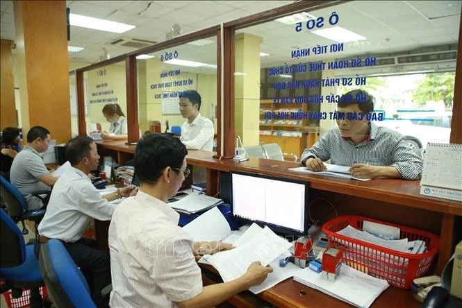 Hoạt động tại Cục Thuế Hà Nội. Ảnh tư liệu: TTXVN phát