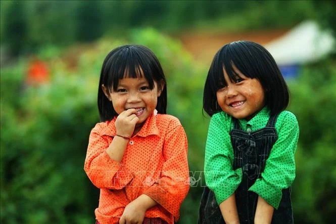 Nét ngây thơ và nụ cười trong sáng của những đứa trẻ vùng cao. Ảnh: Phan Tuấn Anh/TTXVN