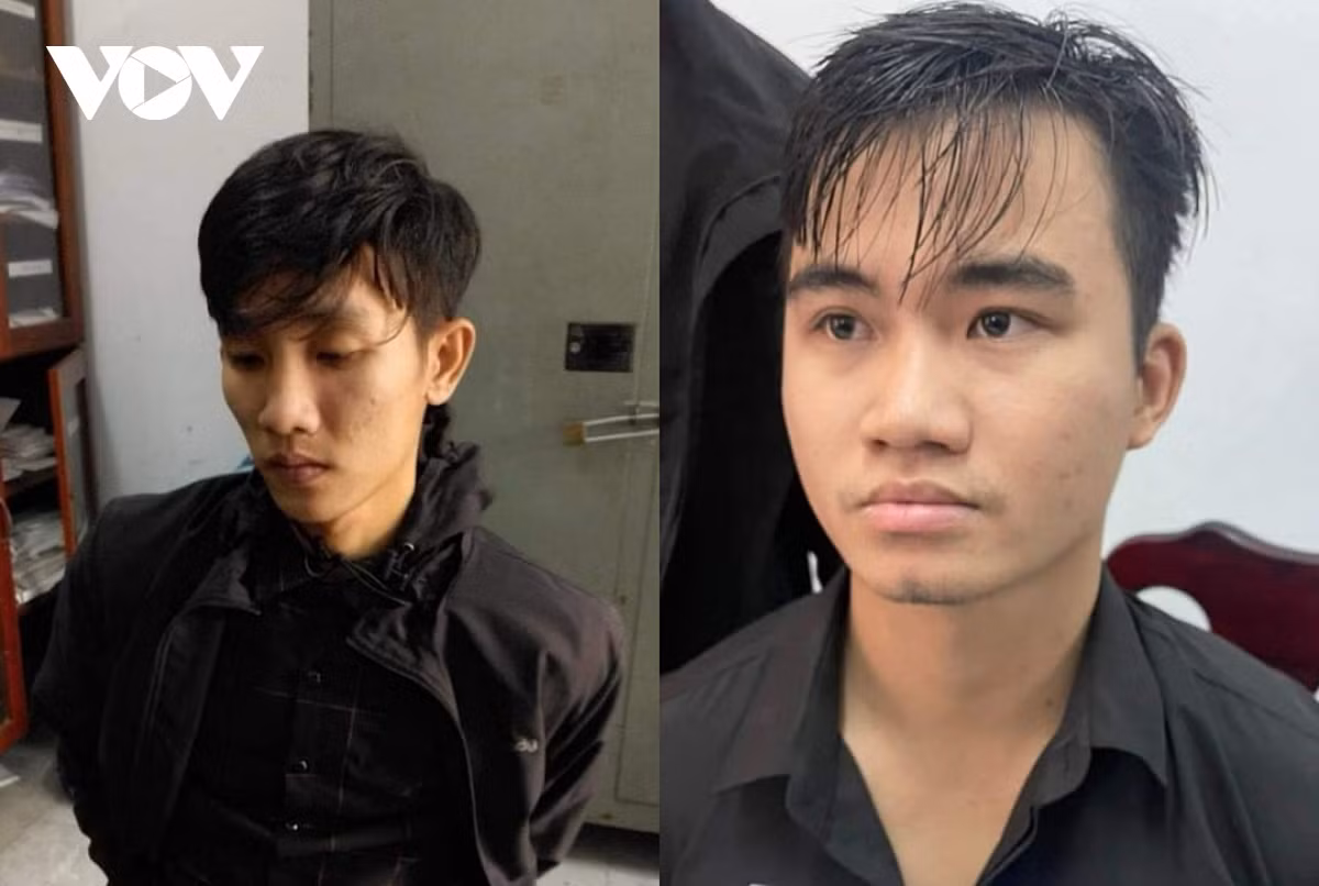 Nguyễn Mạnh Cường (bên phải) và Trần Văn Trí tại Cơ quan Công an.
