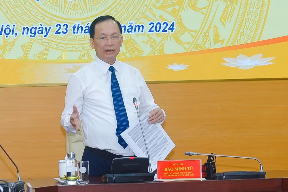 Ông Đào Minh Tú, Phó Thống đốc Ngân hàng Nhà nước phát biểu tại họp báo.