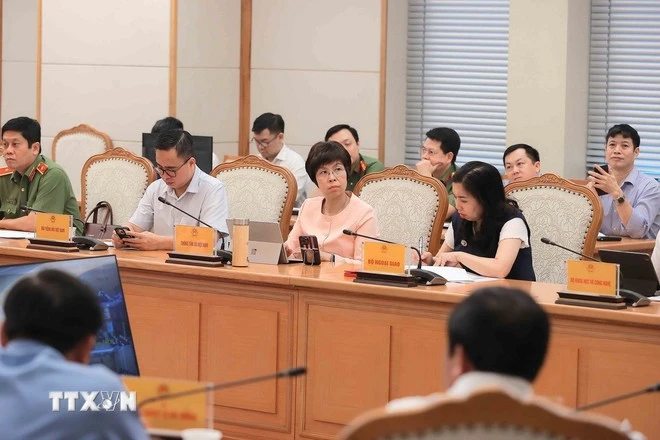 Các đại biểu tham dự tại cuộc họp.
