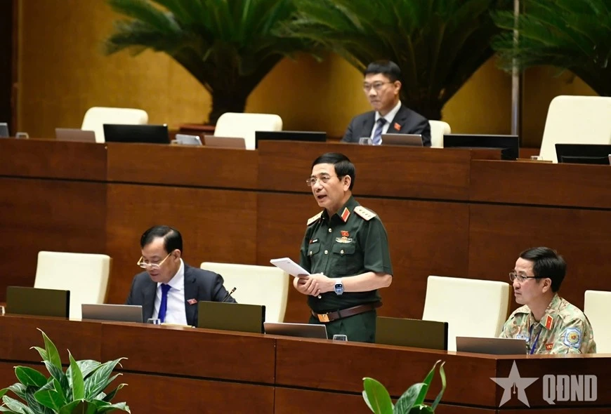Đại tướng Phan Văn Giang giải trình về dự thảo Luật Tham gia lực lượng gìn giữ hòa bình của Liên hợp quốc. Ảnh: TRỌNG HẢI