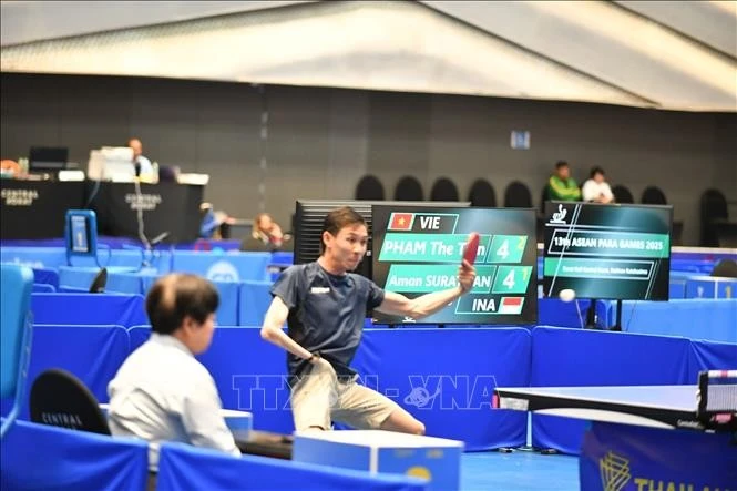 Vận động viên Phạm Thế Tiến giành chiến thắng 3-1 trước đối thủ Indonesia ở bán kết bóng bàn đơn nam để vào tranh chung kết ngày 23/1. Ảnh: TTXVN phát