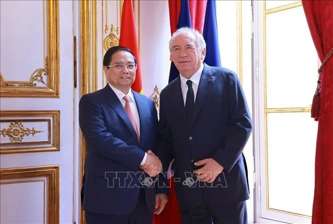 Thủ tướng Phạm Minh Chính và Thủ tướng Pháp François Bayrou. Ảnh: Dương Giang/TTXVN