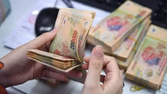Lương tối thiểu dự kiến là 5,7 triệu đồng/tháng