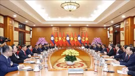 Thường trực Ban Bí thư Trần Cẩm Tú hội đàm với Thường trực Ban Bí thư Trung ương Đảng Nhân dân Cách mạng Lào