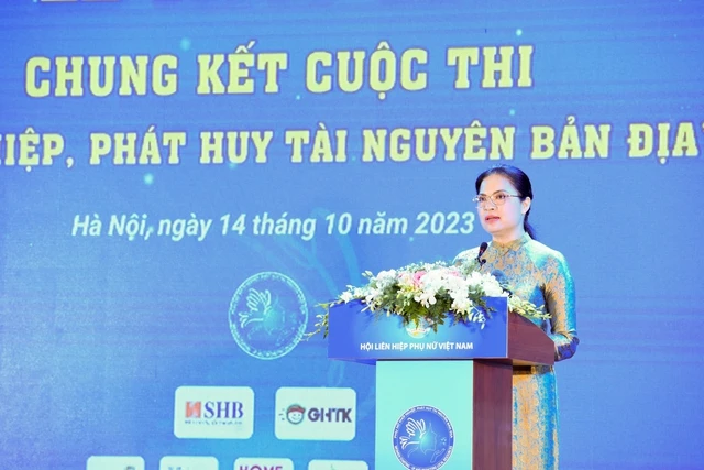 Chủ tịch Hội Liên hiệp Phụ nữ Việt Nam Hà Thị Nga báo cáo tại buổi lễ - Ảnh: VGP/Nhật Bắc