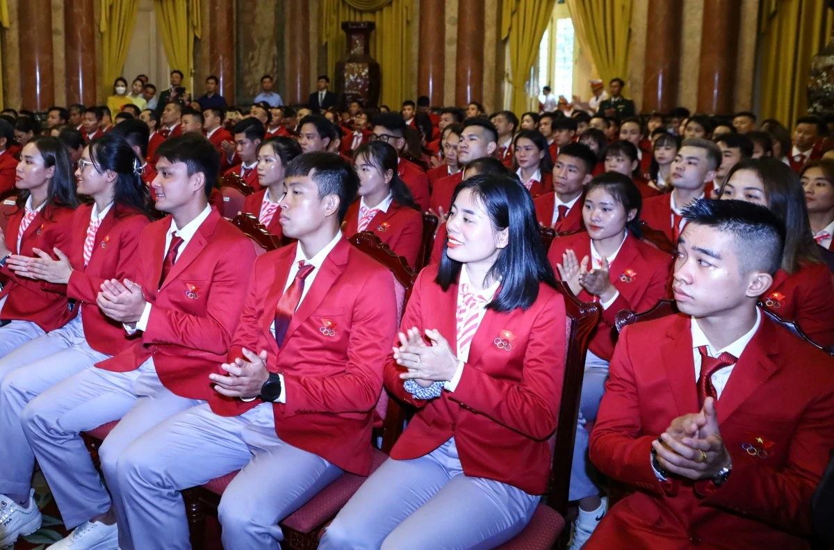 Các huấn luyện viên, vận động viên tại buổi gặp mặt.