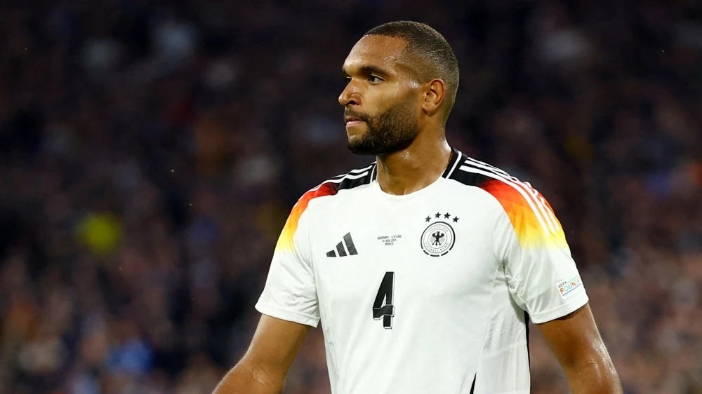 Jonathan Tah tích lũy đủ thẻ vàng nên bị treo giò ở vòng 1/8 (Ảnh: Reuters).