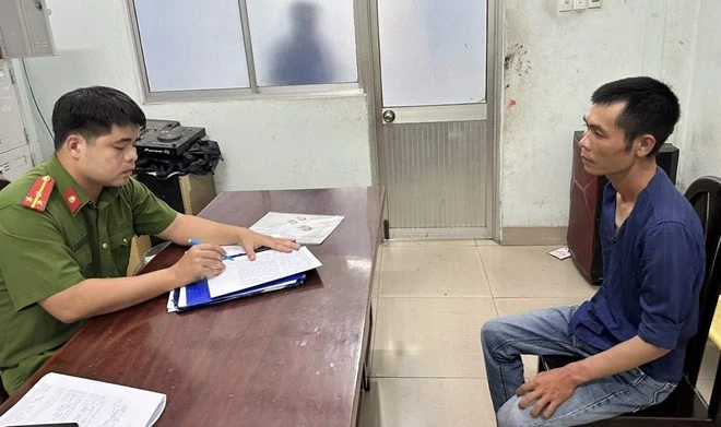 Đối tượng Nguyễn Hữu Thoại tại cơ quan Công an. Ảnh: An Long
