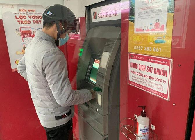Ngân hàng đảm bảo thanh toán an toàn, thông suốt trong dịp tết ảnh 1