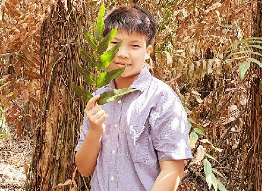 Cao Khải An viết Chuyện của Bắp ăn mơ và xóm Đồi Rơm khi 12 tuổi.