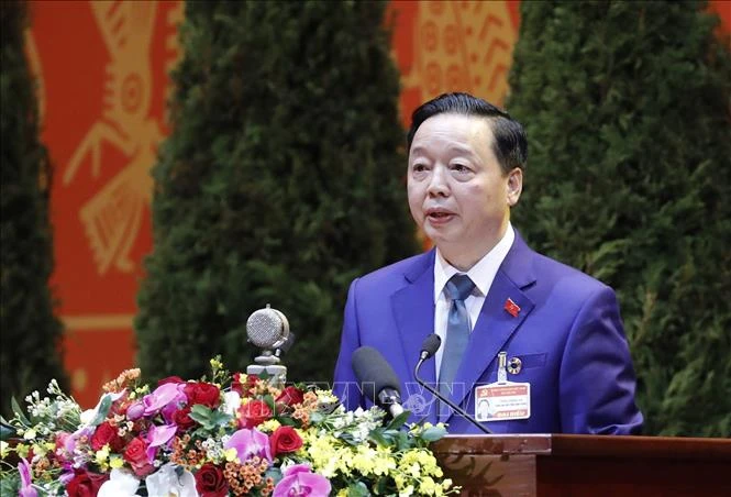 Đồng chí Trần Hồng Hà, Ủy viên Trung ương Đảng, Bộ trưởng Bộ Tài nguyên và Môi trường trình bày tham luận, chiều 27/1.