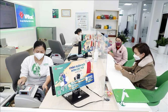 Lãi suất ngân hàng tiếp tục ghi nhận mức tăng mới ảnh 1