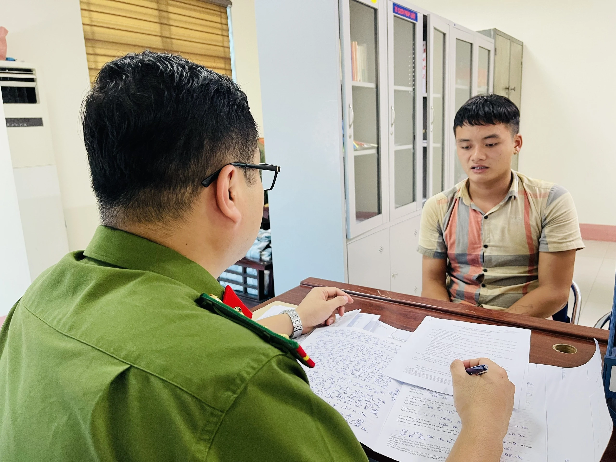 Đặng Ông Nhất tại cơ quan công an.