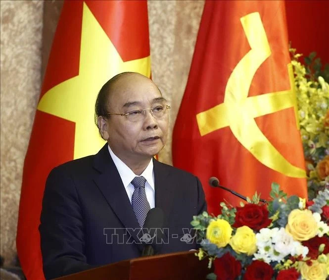 Nguyên Chủ tịch nước Nguyễn Xuân Phúc phát biểu.