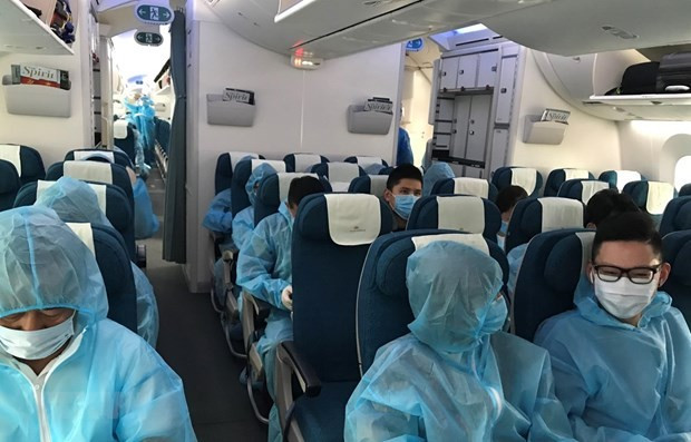 Kết luận điều tra vụ án xảy ra tại Bộ Ngoại giao, thành phố Hà Nội và các tỉnh, thành phố ảnh 1 Một chuyến bay đưa công dân Việt Nam ở nước ngoài về nước. (Ảnh: TTXVN)