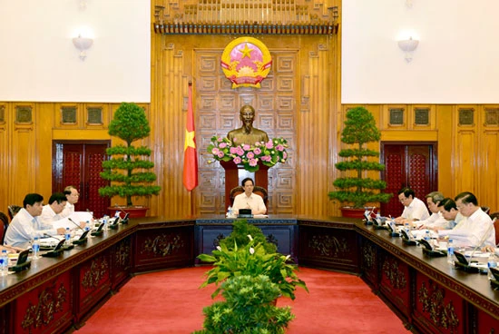 Thủ tướng Nguyễn Tấn Dũng chủ trì cuộc họp về việc đồng nhân dân tệ giảm giá.