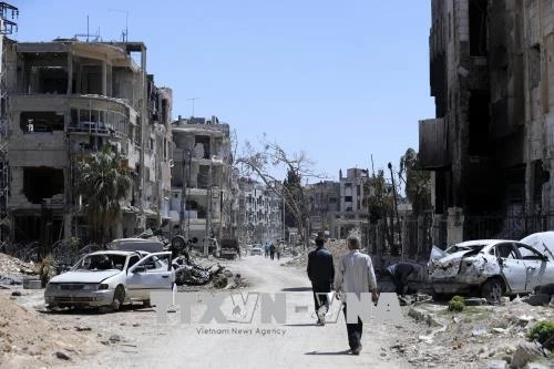 Cảnh đổ nát tại thị trấn Douma, Đông Ghouta, Syria ngày 16/4. Cảnh đổ nát tại thị trấn Douma, Đông Ghouta, Syria ngày 16/4.