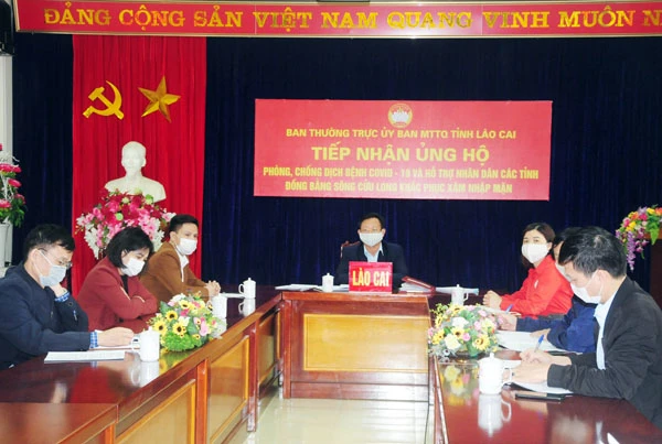 Quang cảnh hội nghị tại điểm cầu Lào Cai.