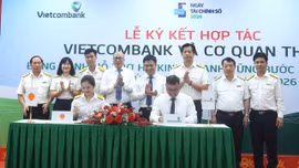 Ngành thuế và Vietcombank ký kết hợp tác đồng hành hỗ trợ hộ kinh doanh 