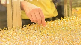 Giá vàng tuần này được dự báo giảm theo giá vàng thế giới