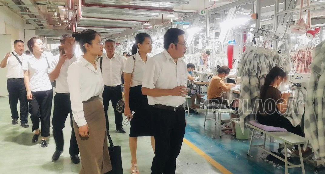 tham quan KCN det may HK.jpg