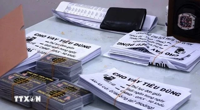 Tang vật trong vụ triệt phá một đường dây tín dụng đen.