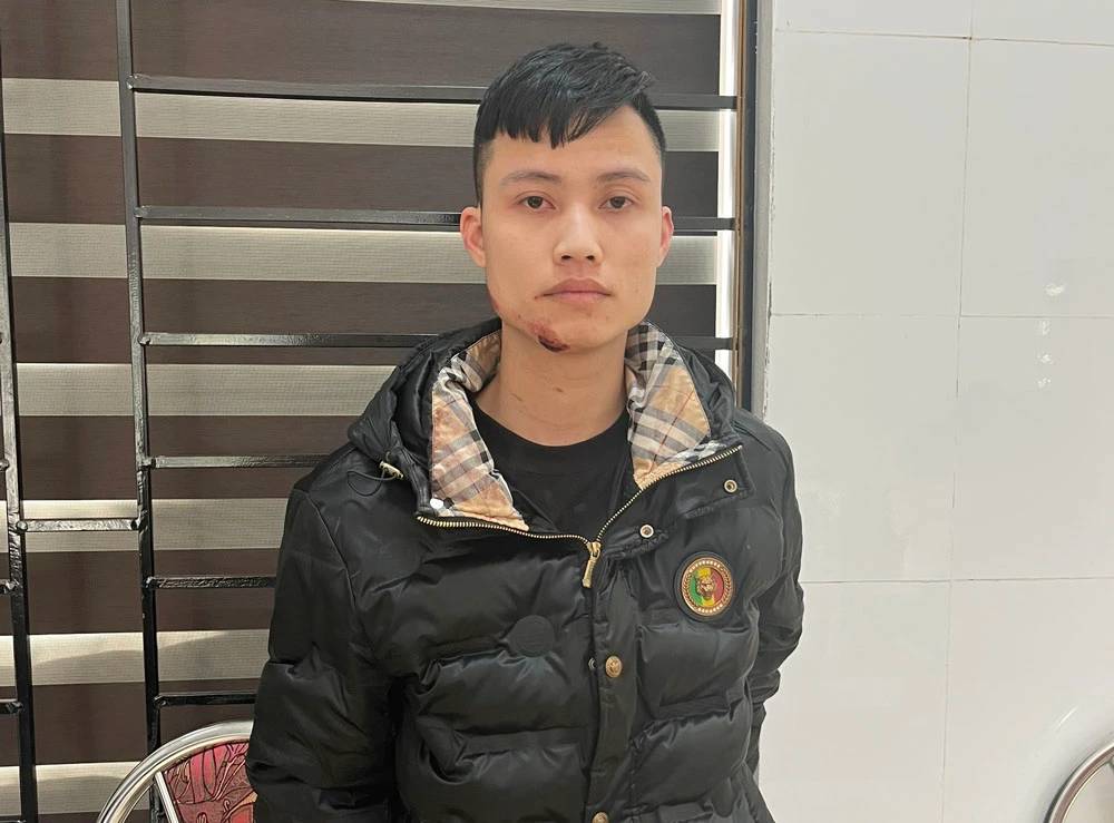 Đối tượng truy nã Nguyễn Xuân Được tại cơ quan điều tra.jpg