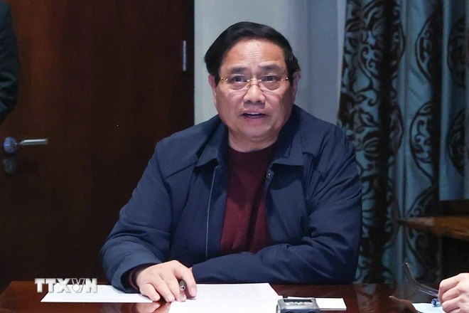 Thủ tướng Phạm Minh Chính chủ trì họp trực tuyến từ Nam Phi, chỉ đạo khắc phục hậu quả mưa lũ.