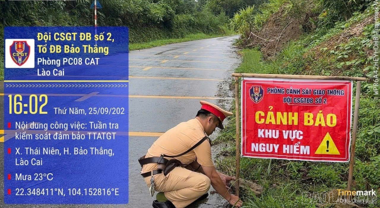Lực lượng Cảnh sát giao thông căng dây, cắm biển cảnh báo khu vực nguy hiểm. baolaocai-br_anh5-8239.jpg