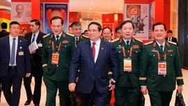 {Ảnh} Ngày làm việc thứ tư Đại hội XIV của Đảng