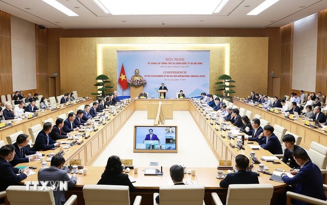 Hội nghị tham vấn các chuyên gia, tổ chức trong nước và quốc tế về thành lập Trung tâm tài chính quốc tế tại Việt Nam. (Ảnh: Dương Giang/TTXVN) Hội nghị tham vấn các chuyên gia, tổ chức trong nước và quốc tế về thành lập Trung tâm tài chính quốc tế tại Việt Nam. (Ảnh: Dương Giang/TTXVN)