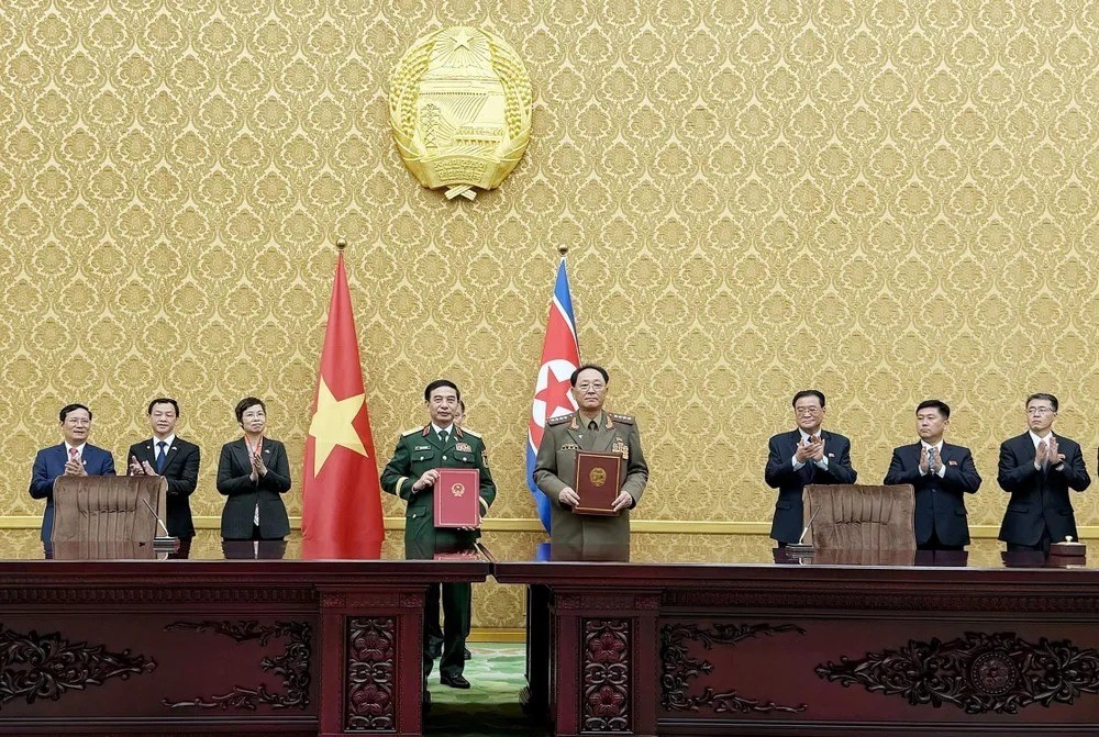 Lễ ký Ý định thư giữa Bộ Quốc phòng Việt Nam và Bộ Quốc phòng Triều Tiên về hợp tác trong lĩnh vực quốc phòng. y-dinh-thu.jpg