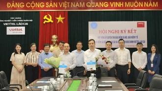 Bảo hiểm xã hội tỉnh và Chi nhánh Bưu chính Viettel Lào Cai ký kết hợp đồng ủy quyền thu bảo hiểm