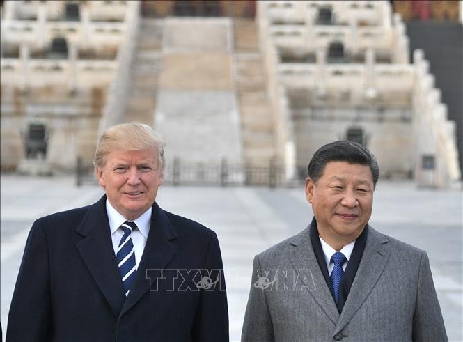 Chủ tịch Trung Quốc Tập Cận Bình (phải) và Tổng thống Mỹ Donald Trump trong cuộc gặp tại Bắc Kinh, Trung Quốc năm 2017.