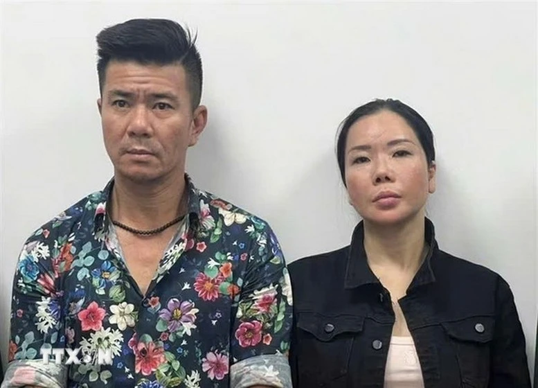 Hai vợ chồng bị can Lê Văn Đông và Nguyễn Thị Mai Anh - Ảnh: VKSND thành phố Hà Nội