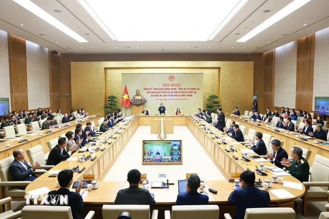 Hội nghị tổng kết “Chiến dịch Quang Trung” xây dựng lại nhà cho các gia đình bị thiệt hại do bão lũ tại miền Trung.