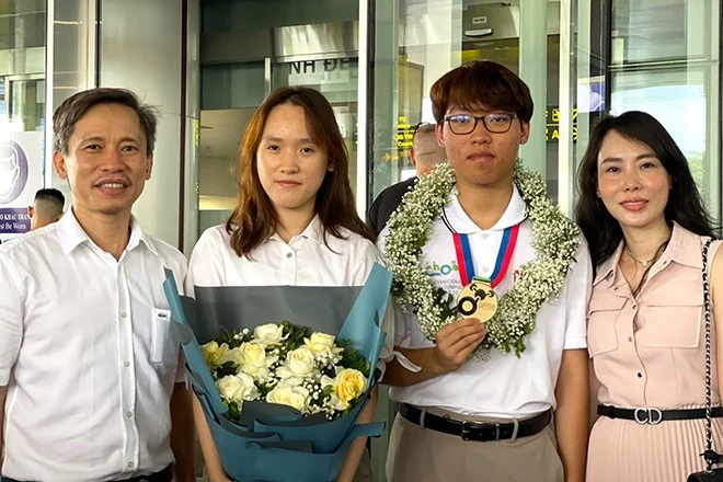 2 anh em trong một gia đình đạt Huy chương Vàng Olympic quốc tế ảnh 1