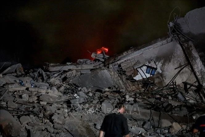 Cảnh đổ nát sau vụ không kích của Israel vào trụ sở chính của Hezbollah tại Beirut, Li-băng, ngày 27/9/2024.