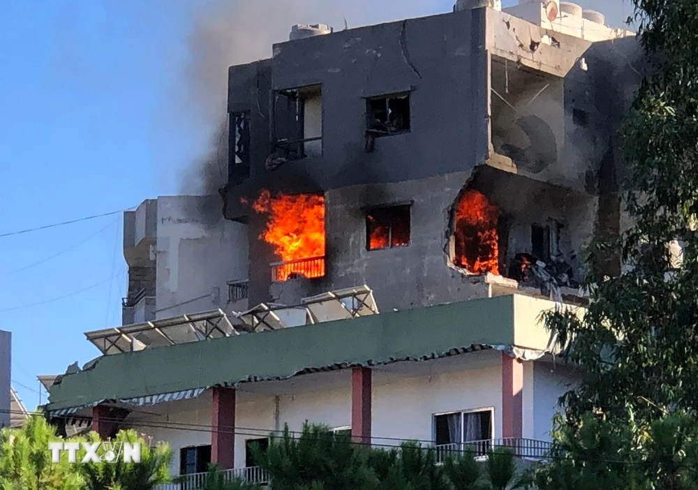 Tòa nhà bị phá hủy sau cuộc không kích của Israel tại Beirut, Liban.
