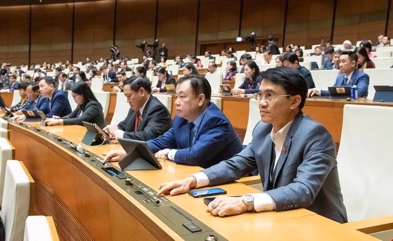 Đại biểu Quốc hội ấn nút biểu quyết tại Kỳ họp bất thường lần thứ 9.