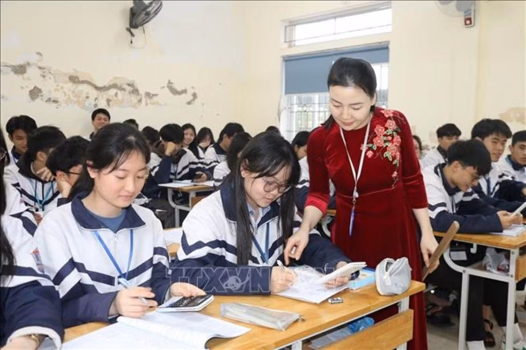 Quy định mới về dạy thêm, học thêm sẽ giữ được sự liêm chính trong hoạt động giáo dục của Nhà trường. Ảnh: Bích Huệ/TTXVN