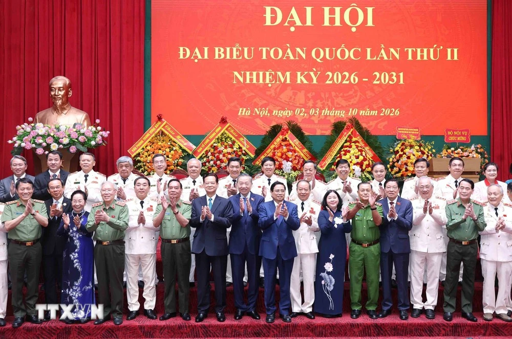 Tổng Bí thư, Chủ tịch nước Tô Lâm và các đại biểu tham dự Đại hội toàn quốc lần thứ II Hội Cựu Công an nhân dân Việt Nam - Ảnh: TTXVN